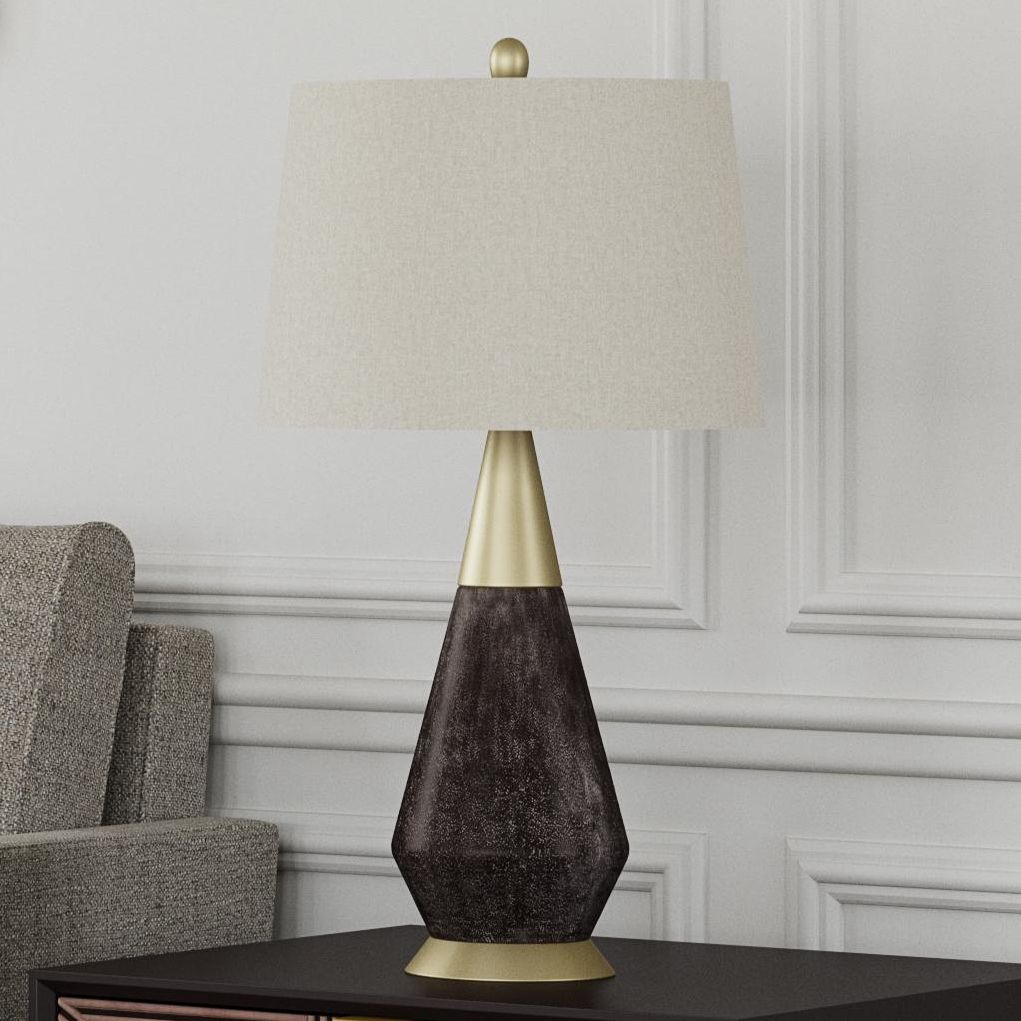 grey and brass table lamp