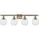 Belfast 4 Light 36" Bath Light - Antique Brass - Deco Swirl Shade