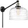 Bell 12" Black Antique Brass LED Swing Arm With Clear Deco Swirl Shade