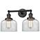 Bell 12" High Bronze 2-Light Wall Sconce w/ Clear Shade