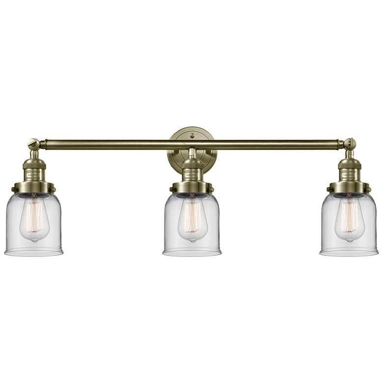 Image 1 Bell 3 Light 30" Bath Light - Antique Brass - Clear Shade