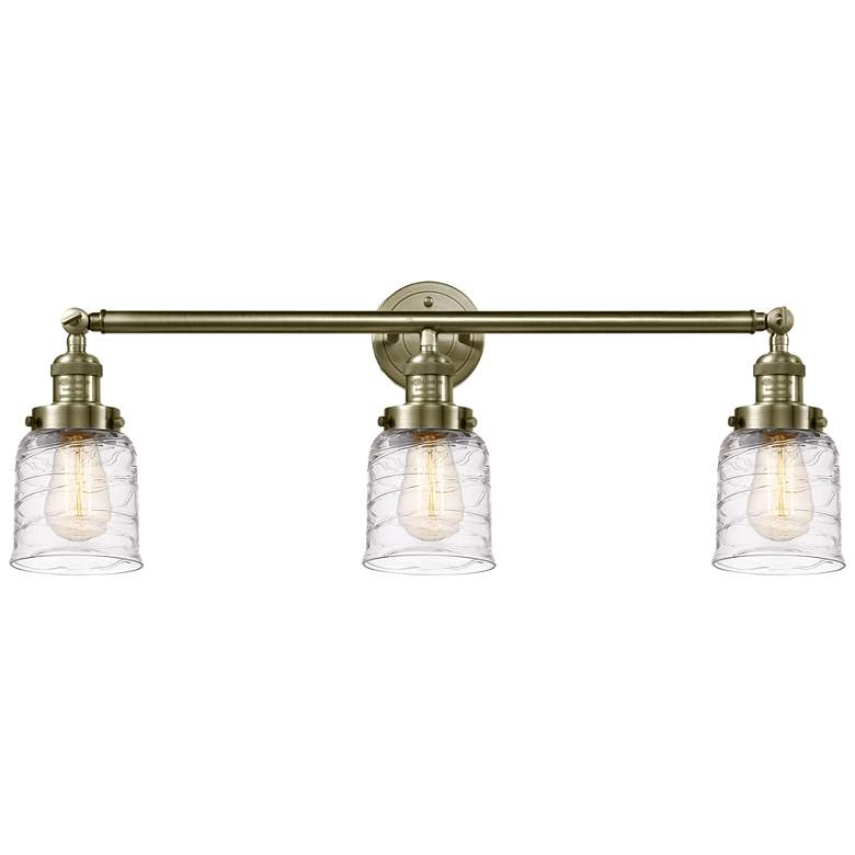 Image 1 Bell 3 Light 30" Bath Light - Antique Brass - Deco Swirl Shade