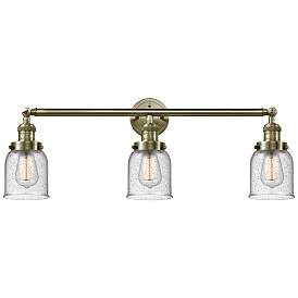 Image1 of Bell 3 Light 30" Bath Light - Antique Brass - Seedy Shade