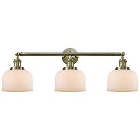 Image1 of Bell 3 Light 32" Bath Light - Antique Brass - Matte White Shade