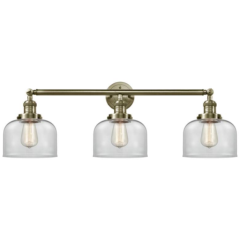 Image 1 Bell 3 Light 32" LED Bath Light - Antique Brass - Clear Shade