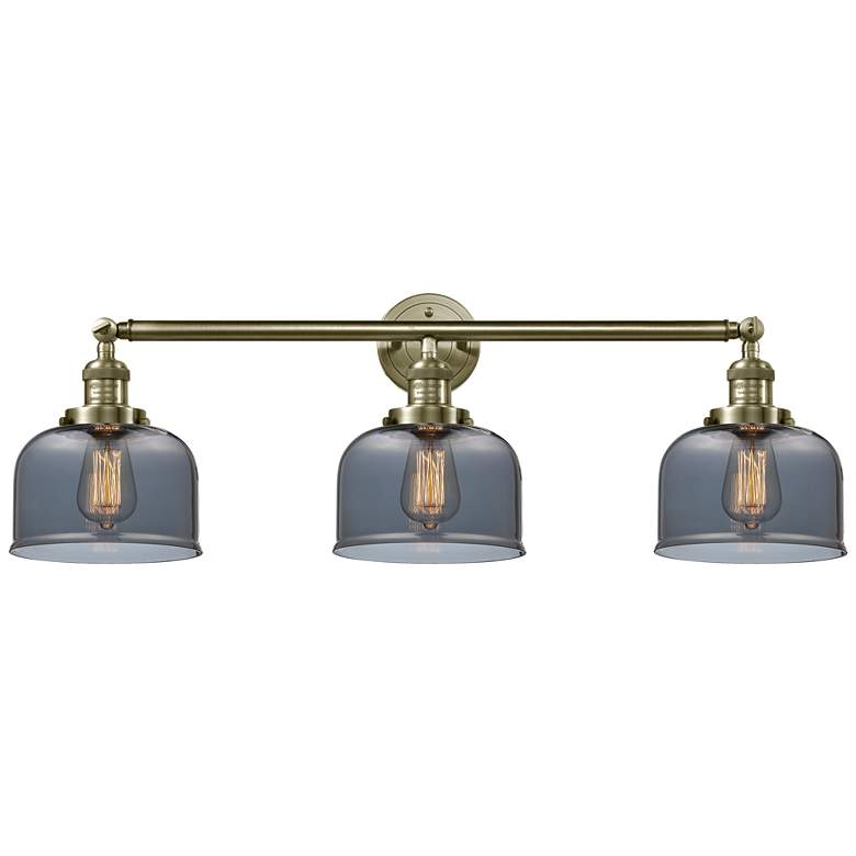 Image 1 Bell 3 Light 32" LED Bath Light - Antique Brass - Plated Smoke Shade