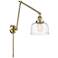 Bell 8" Antique Brass LED Double Swing Arm With Clear Deco Swirl Shade