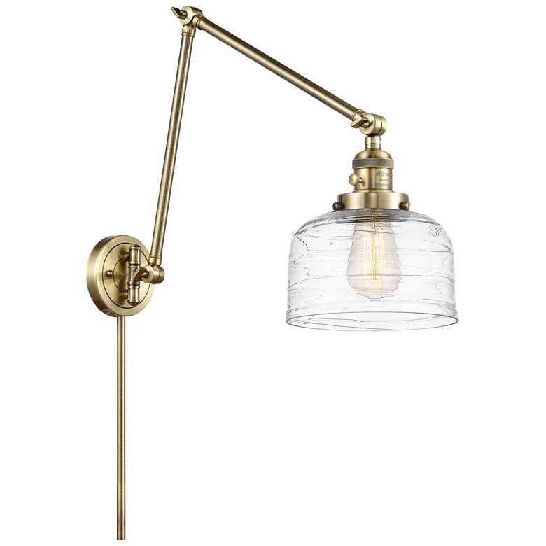 Image 1 Bell 8" Antique Brass LED Double Swing Arm With Clear Deco Swirl Shade