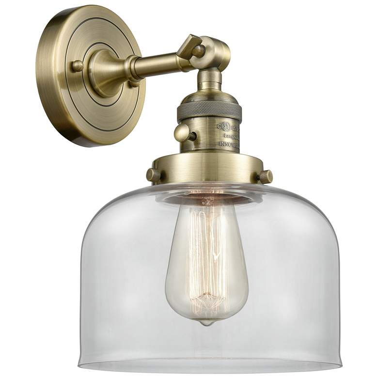 Image 1 Bell 8" Antique Brass Sconce w/ Clear Shade