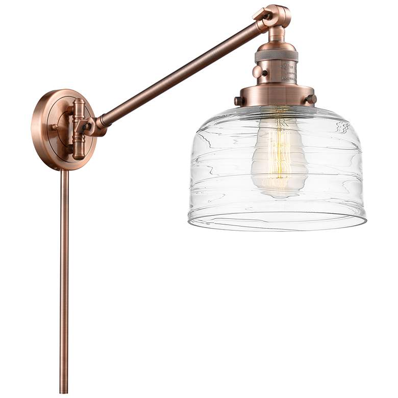 Image 1 Bell 8" Antique Copper LED Swing Arm With Clear Deco Swirl Shade