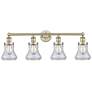 Bellmont 33.5"W 4 Light Antique Brass Bath Vanity Light With Clear Sha