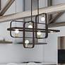 Thumbnail1 of Bergamo 6 Light Bronze Linear Chandelier with Antique Brass Accents