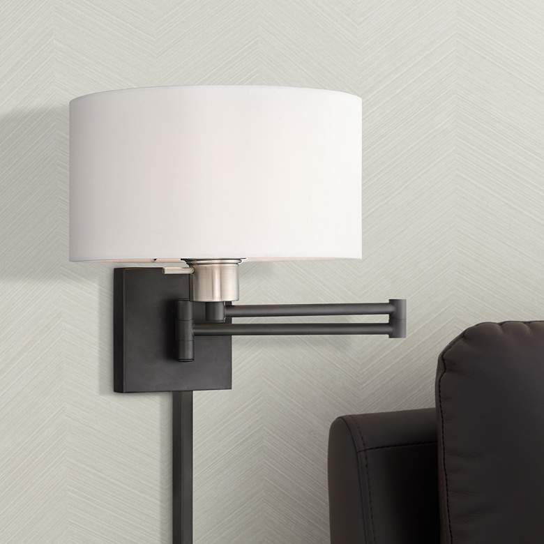 Black Swing Arm Wall Lamp with Off-White Fabric Drum Shade