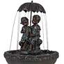 Boy and Girl Under Umbrella Fountain