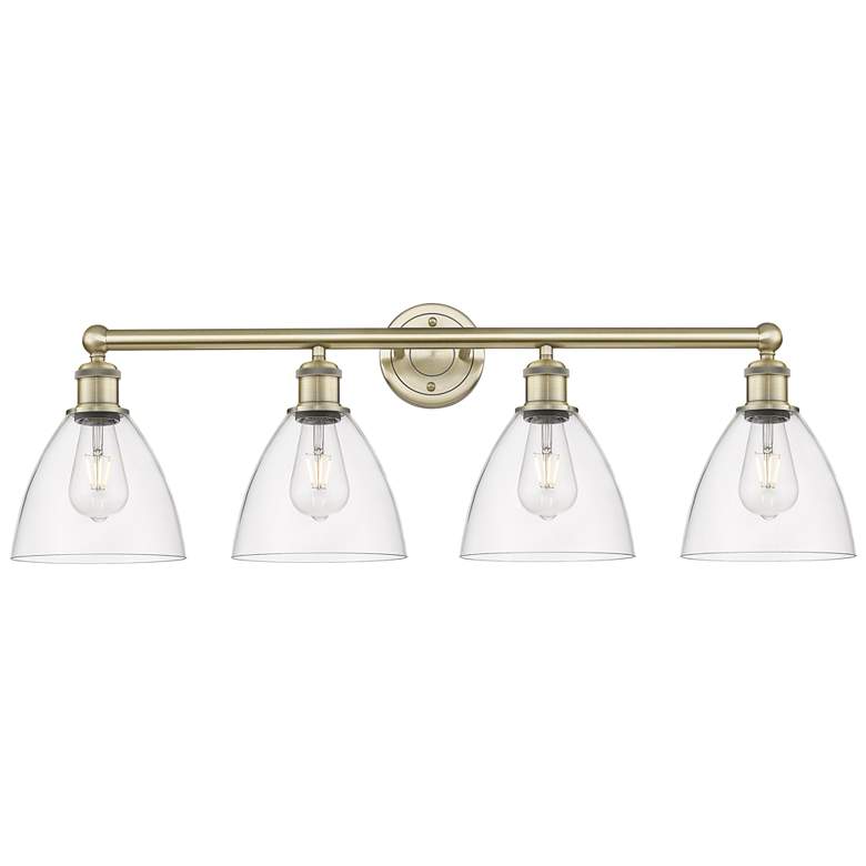 Image 1 Bristol Glass 34.5"W 4 Light Antique Brass Bath Light With Clear Shade
