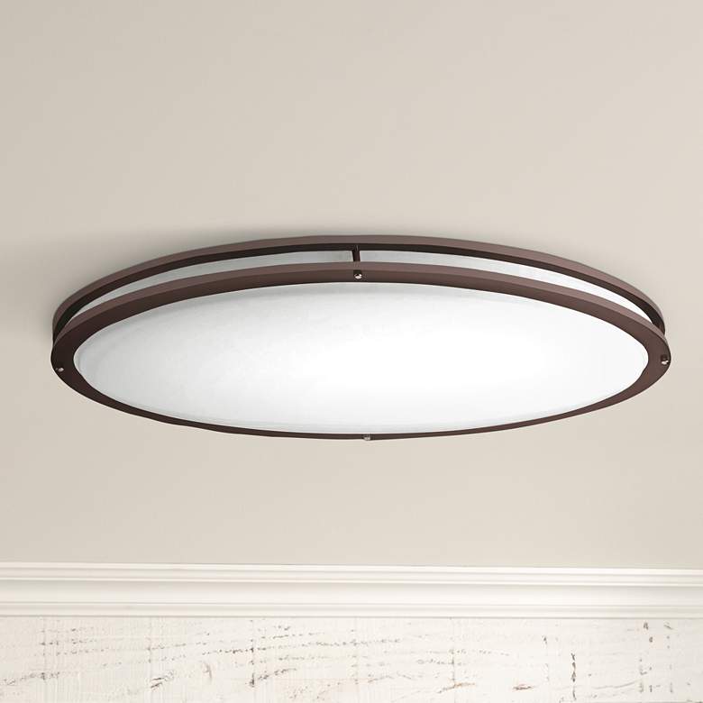 Image 1 Bronze Oval 32 1/2 inch Wide 4707 Lumen LED Ceiling Light