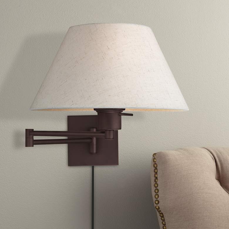 Image 1 Bronze Swing Arm Wall Lamp with Oatmeal Fabric Empire Shade
