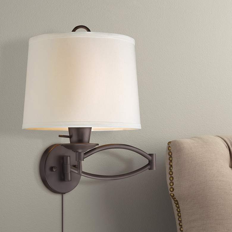 Image 1 Bronze Swing Arm Wall Lamp with Off-White Linen Shade