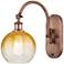 Brookhaven Globe 14" High Antique Copper Swiveling Sconce with Amber Shade