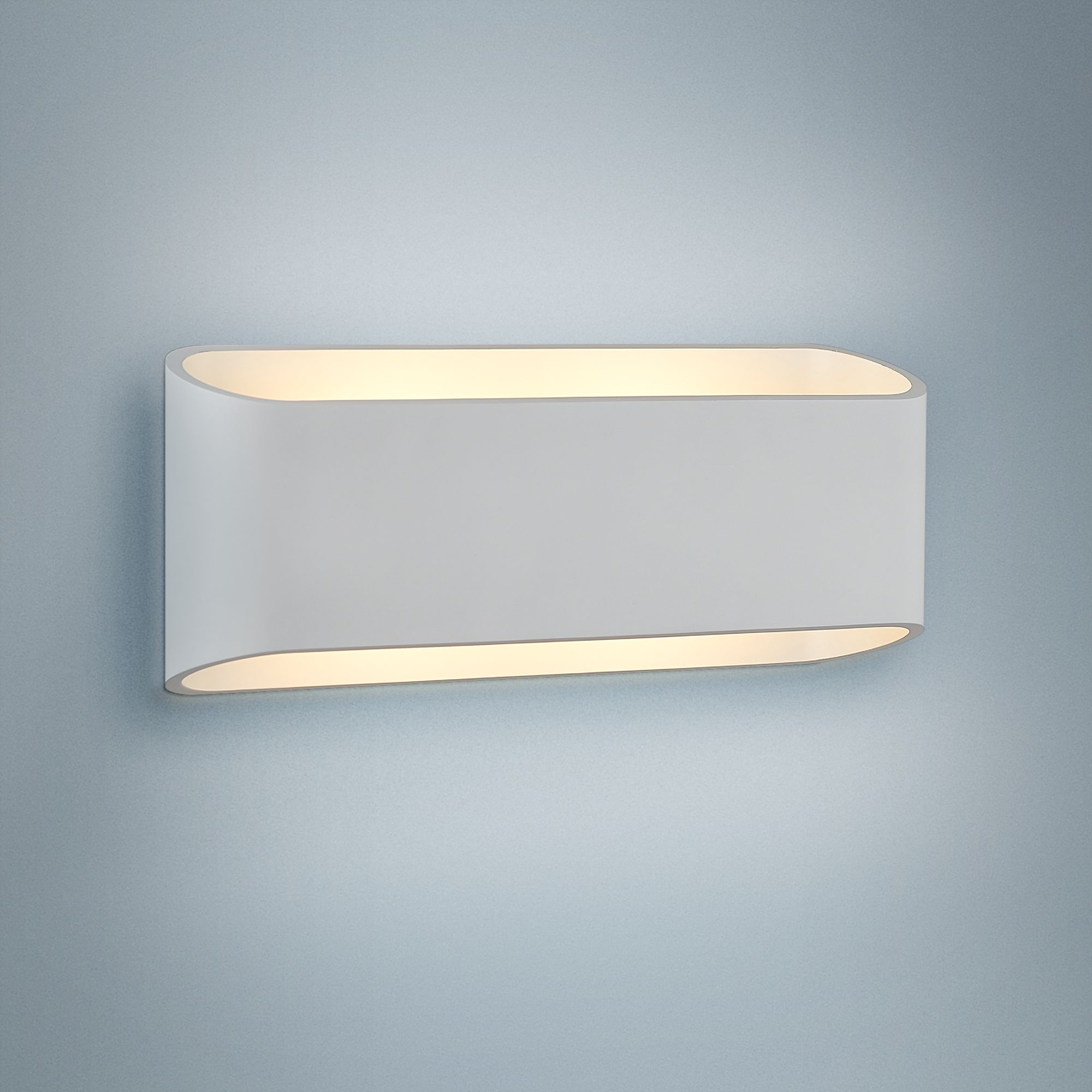 Low profile store wall sconce