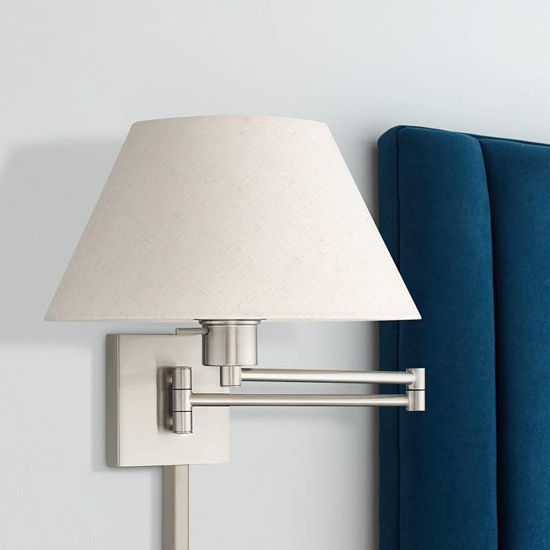 Image 1 Brushed Nickel Swing Arm Wall Lamp with Oatmeal Empire Shade