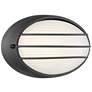 Cabo 5 1/4" High Black and White Oval Modern LED Outdoor Wall Light