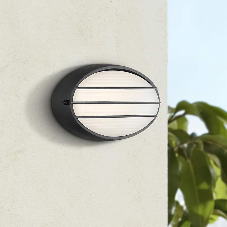 Image 1 Cabo 5 1/4" High Black and White Oval Modern LED Outdoor Wall Light