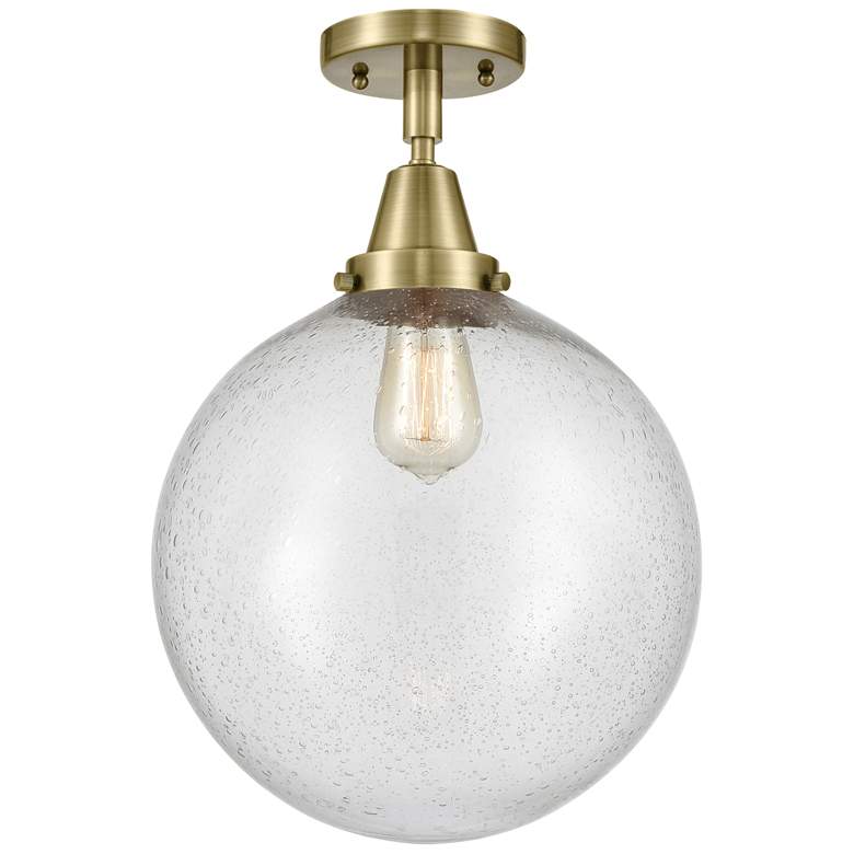 Image 1 Caden Beacon 12" Flush Mount - Antique Brass - Seedy Shade