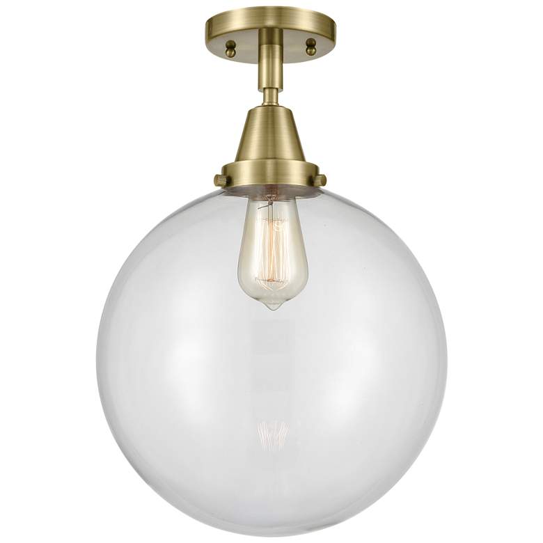 Image 1 Caden Beacon 12" LED Flush Mount - Antique Brass - Clear Shade