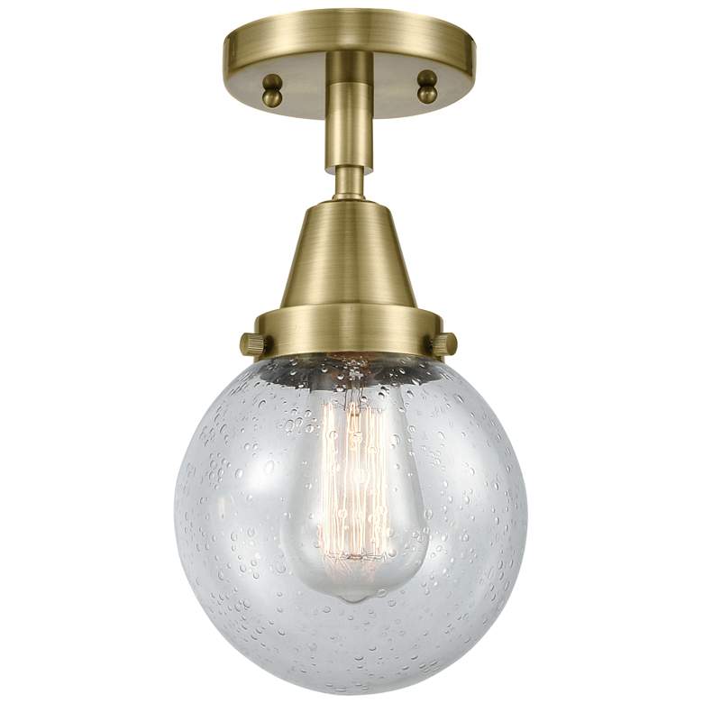 Image 1 Caden Beacon 6" Flush Mount - Antique Brass - Seedy Shade