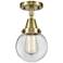 Caden Beacon 6" LED Flush Mount - Antique Brass - Clear Shade