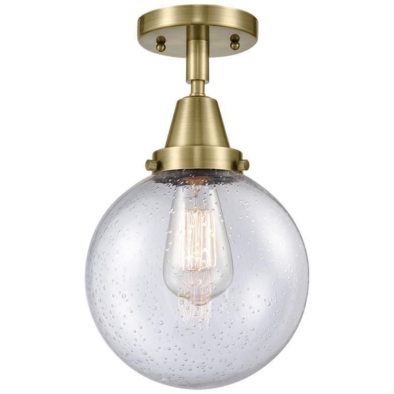 Image 1 Caden Beacon 8" LED Flush Mount - Antique Brass - Seedy Shade