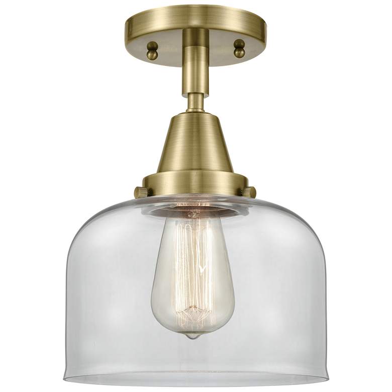 Image 1 Caden Bell 8 inch Flush Mount - Antique Brass - Clear Shade