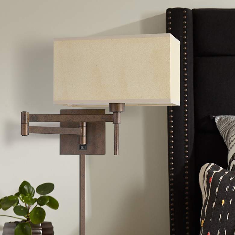 Image 1 Cal Lighting Robson 15 1/4" Wide Rust Plug-In Swing Arm Wall Lamp