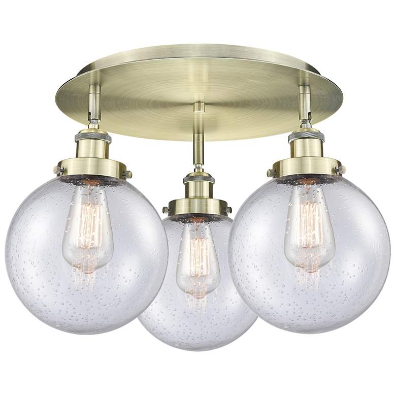 Image 1 Canton 19.75" Wide 3 Light Antique Brass Flush Mount With Seedy Glass