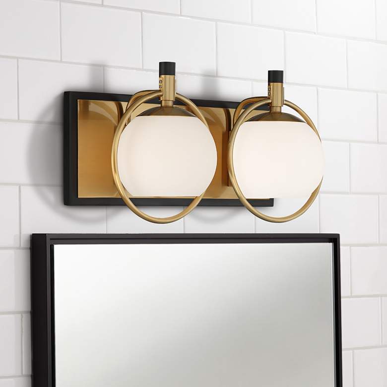 Image 1 Carlyn 9 3/4"H Antiqued Brass and Black 2-Light Wall Sconce