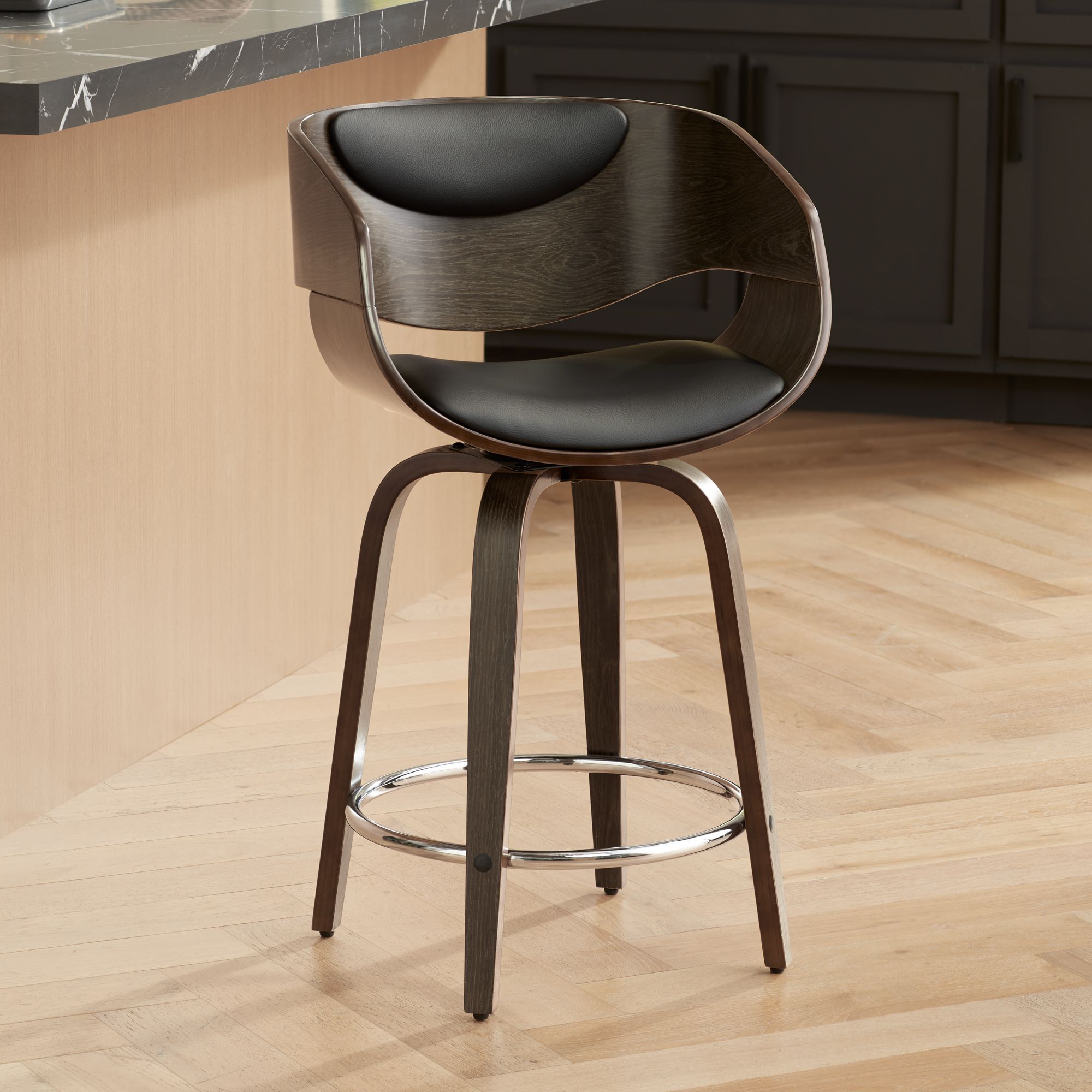 Carson 23 1/2" Black Faux Leather Swivel Counter Stools Set of 2 in scene