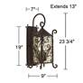 Casa Seville 23 3/4" High Iron Scroll Traditional Outdoor Wall Light in scene