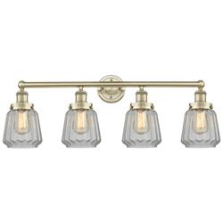 Chatham 33.5"W 4 Light Antique Brass Bath Vanity Light With White Shad