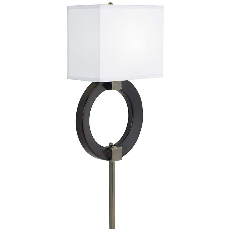 Image 1 Circle Black and White Shaded Plug-In Wall Lamp