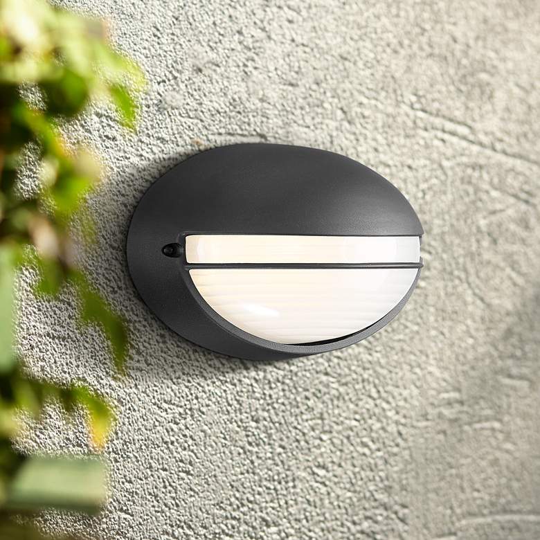 Image 1 Clifton 5 1/4 inch High Black Oval LED Outdoor Wall Light