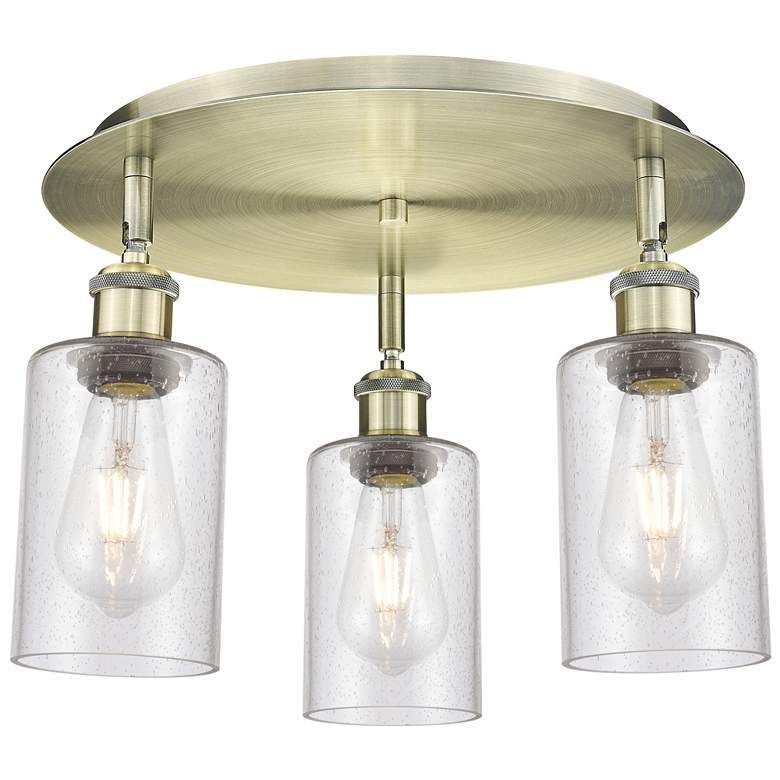 Image 1 Clymer 15.63" Wide 3 Light Antique Brass Flush Mount With Seedy Glass