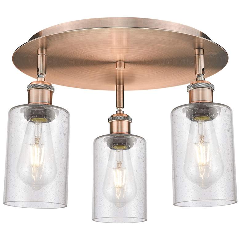 Image 1 Clymer 15.63"W 3 Light Antique Copper Flush Mount With Seedy Glass Sha