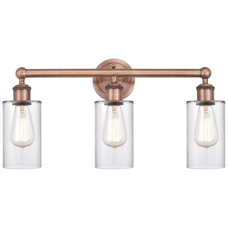 Image 1 Clymer 21.88"W 3 Light Antique Copper Bath Vanity Light With Clear Sha