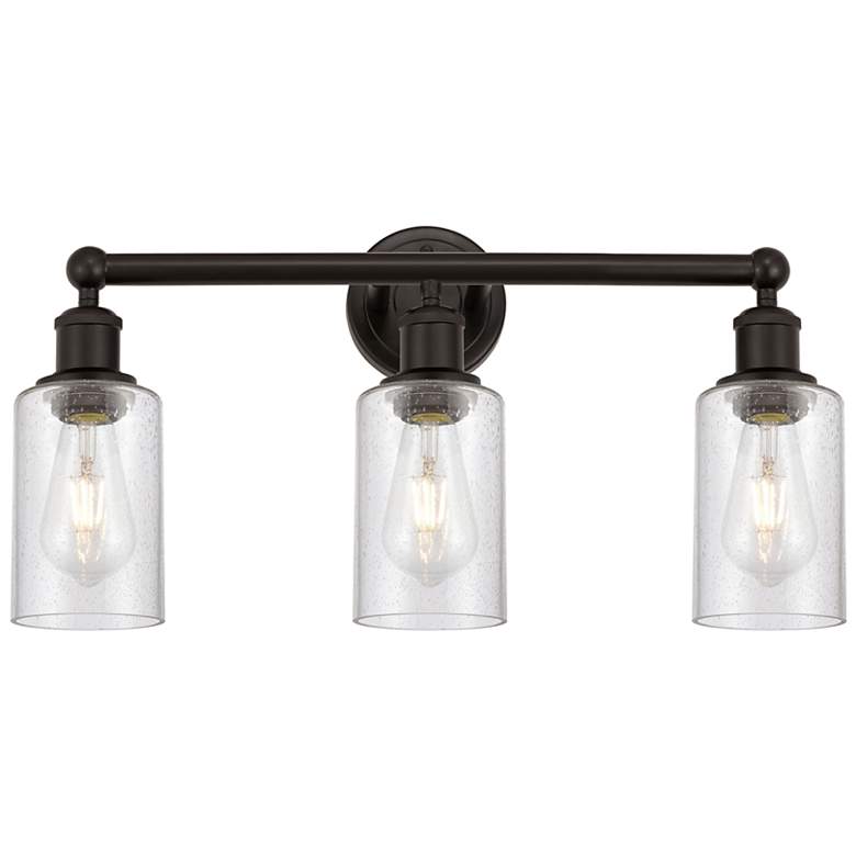 Image 1 Clymer 21.88"W 3 Light Oil Rubbed Bronze Bath Vanity Light w/ Seedy Sh