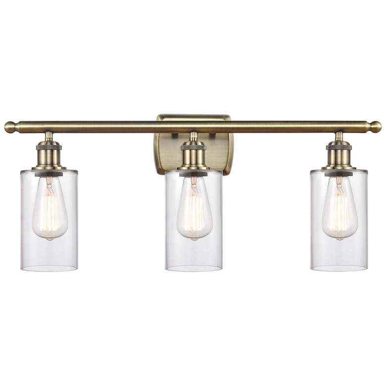 Image 1 Clymer 26" 3-Light Antique Brass Bath Light w/ Clear Shade