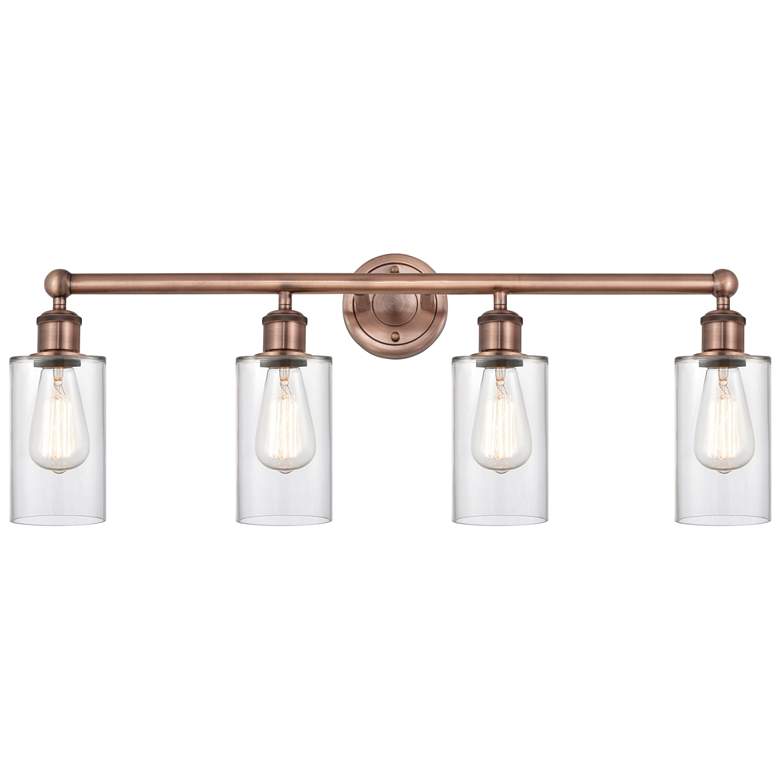 Image 1 Clymer 30.88"W 4 Light Antique Copper Bath Vanity Light With Clear Sha