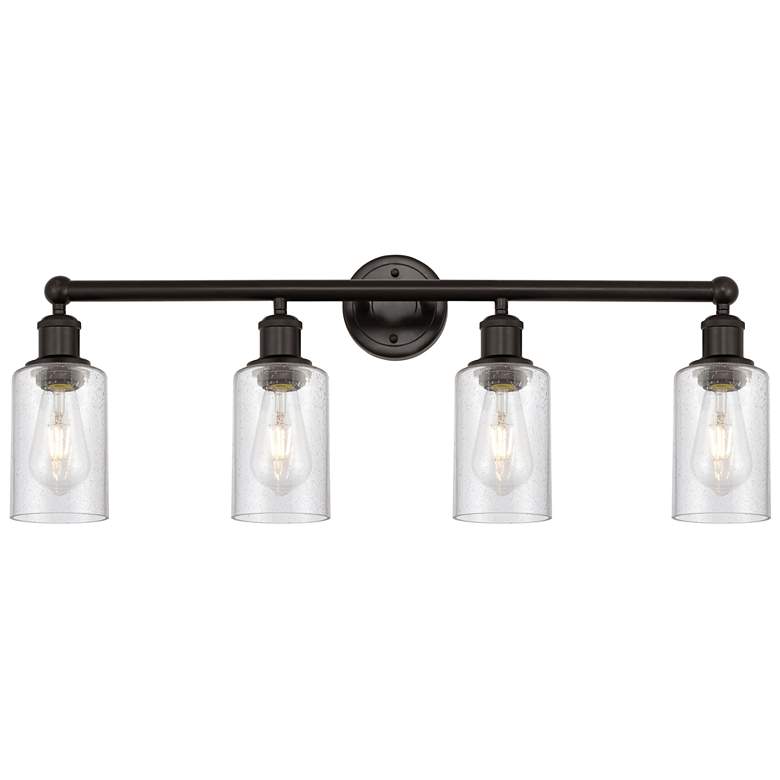 Image 1 Clymer 30.88"W 4 Light Oil Rubbed Bronze Bath Vanity Light w/ Seedy Sh