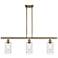 Clymer 36" Wide 3 Light Antique Brass Stem Hung Island Light w/ Clear