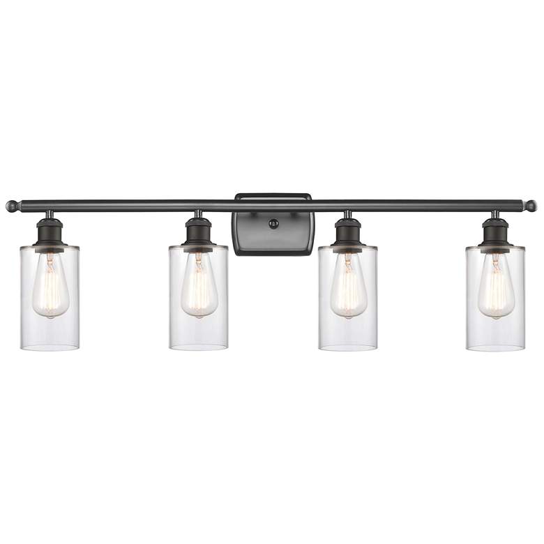 Image 1 Clymer 36 inch Wide 4 Light Oil Rubbed Bronze Bath Vanity Light w/ Clear S